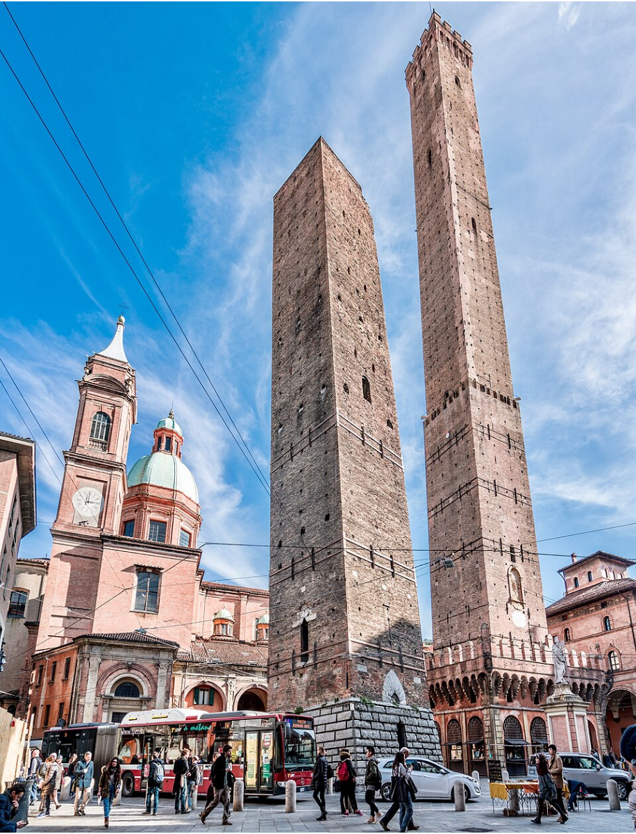 Wikipedia's Two Towers, Bologna article showing a photo of the leaning Asinelli and Garisenda towers rising above the surrounding rooftops