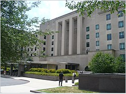Wikipedia's Harry S. Truman Building article showing a photo of the State Department headquarters building's entrance in Washington, DC