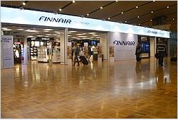 Wikipedia's Tax-free shopping article showing a photo of a tax-free retailer's storefront inside an airport