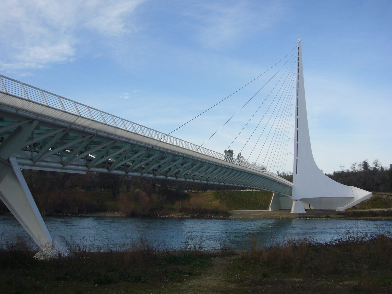 The Sundial Bridge, a white cable-stayed pedestrian bridge designed by Santiago Calatrava, spanning the Sacramento River in Redding, California