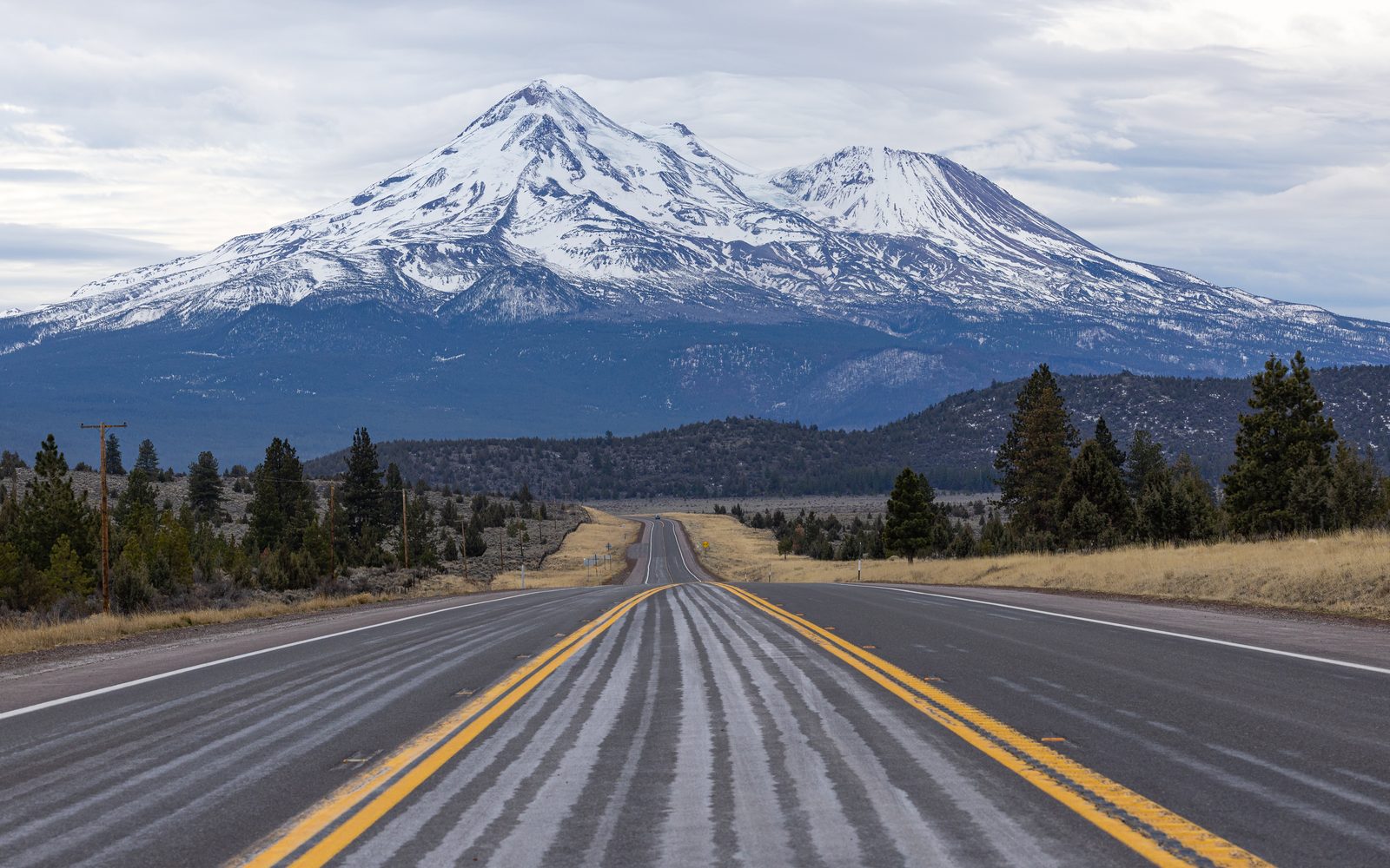 Mount Shasta, a large snow-capped stratovolcano in Northern California, seen from Highway 97