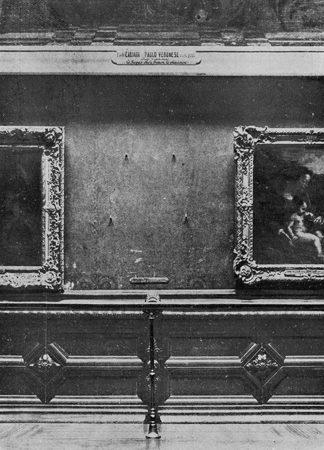 The empty wall in the Louvre's Salon Carre where the Mona Lisa hung, photographed shortly after the 1911 theft
