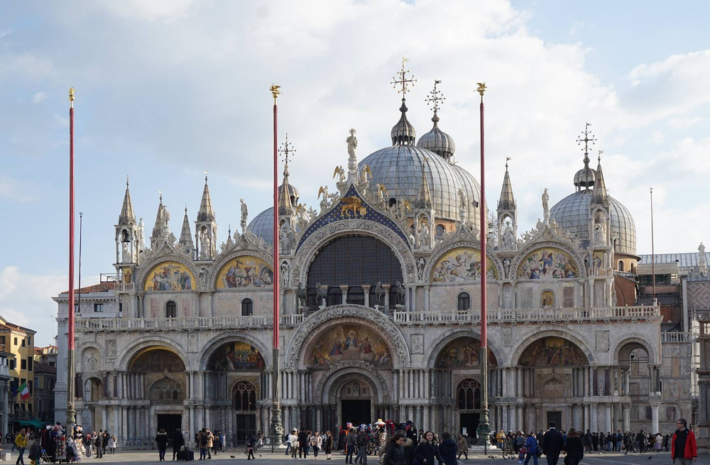 St. Mark's Basilica's official ticket office page, showing a photo of the basilica's ornately mosaicked and sculpted facade above St. Mark's Square